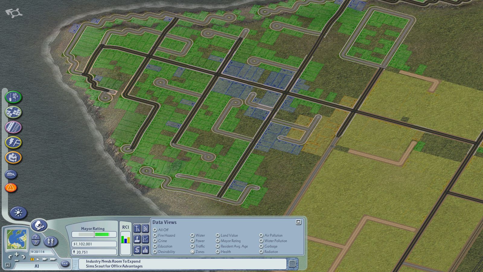 SimCity 4 screenshot of a coastal city, with the RCI demand indicator visible in the bottom-left corner of the game's GUI